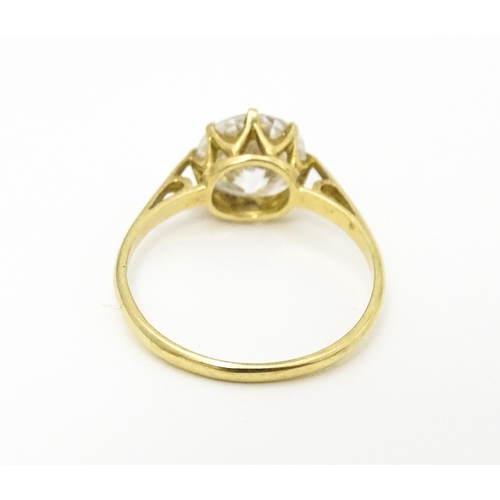 609 - A 9ct gold dress ring set with cubic zirconia. Ring size approx. L 1/2