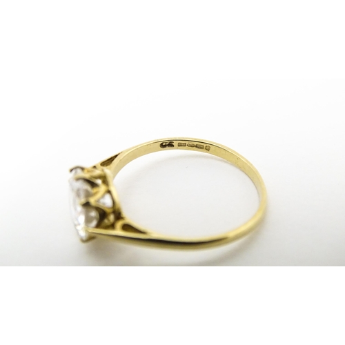 609 - A 9ct gold dress ring set with cubic zirconia. Ring size approx. L 1/2