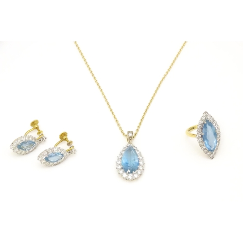 621 - An 18ct gold suite of jewellery comprising ring, pendant necklace and drop earrings, all set with ce... 