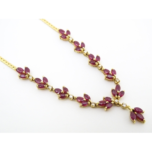 624 - An 18ct gold necklace set with 33 rubies and 10 diamonds. Approx 17