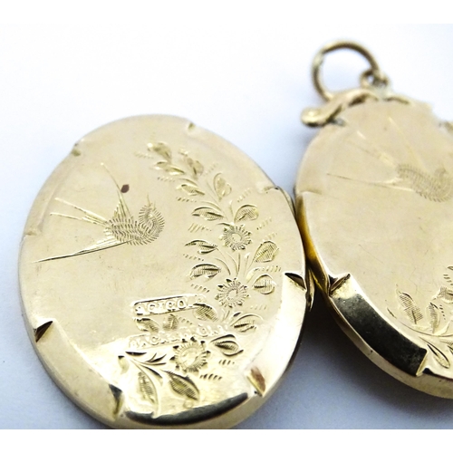 643 - A 9ct gold back & front locket of oval form with engraved swallow and forget-me-knot detail. Approx.... 