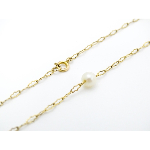 649 - A 9ct gold necklace set with pearls. Approx. 17