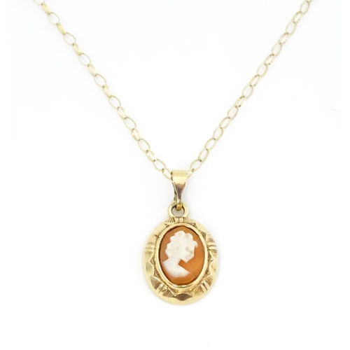 661 - A 9ct gold cameo pendant, with a 9ct gold chain. Pendant approx. 1/2