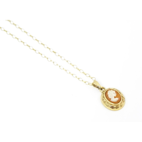 661 - A 9ct gold cameo pendant, with a 9ct gold chain. Pendant approx. 1/2