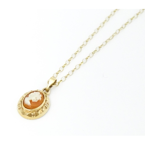 661 - A 9ct gold cameo pendant, with a 9ct gold chain. Pendant approx. 1/2