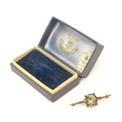 662 - A 20thC Russian silver gilt bar brooch set with central smokey topaz stone. In original box. The bro... 