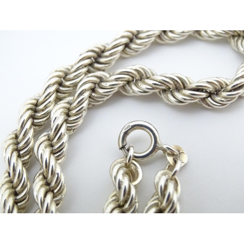 677 - A silver necklace of rope twist form. Approx 28