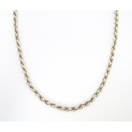 677 - A silver necklace of rope twist form. Approx 28