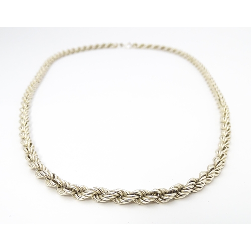 677 - A silver necklace of rope twist form. Approx 28