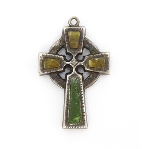 681 - A silver pendant formed as a celtic cross. Hallmarked  Chester 1924 maker William Henry Leather. App... 