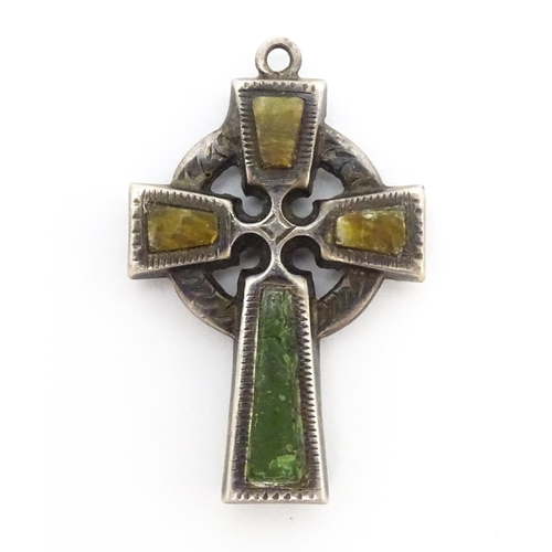 681 - A silver pendant formed as a celtic cross. Hallmarked  Chester 1924 maker William Henry Leather. App... 