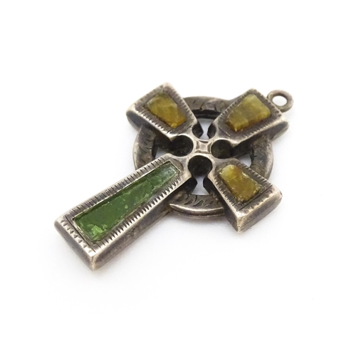 681 - A silver pendant formed as a celtic cross. Hallmarked  Chester 1924 maker William Henry Leather. App... 