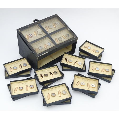 725 - A countertop jewellers display for rolled gold cufflinks with eight additional boxed pairs. Approx. ... 