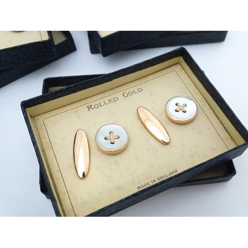 725 - A countertop jewellers display for rolled gold cufflinks with eight additional boxed pairs. Approx. ... 