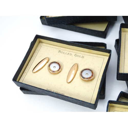 725 - A countertop jewellers display for rolled gold cufflinks with eight additional boxed pairs. Approx. ... 