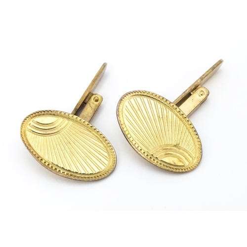 749 - A pair of 9ct gold cufflinks hallmarked Birmingham 1967 maker Henry Griffith & Sons Ltd and titled '... 