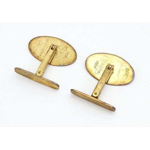 749 - A pair of 9ct gold cufflinks hallmarked Birmingham 1967 maker Henry Griffith & Sons Ltd and titled '... 