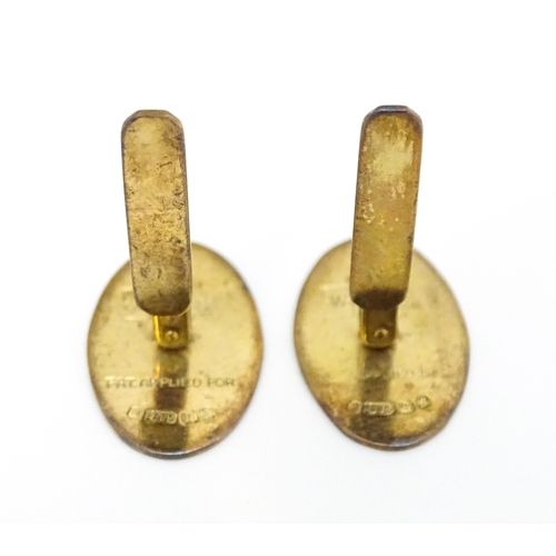 749 - A pair of 9ct gold cufflinks hallmarked Birmingham 1967 maker Henry Griffith & Sons Ltd and titled '... 