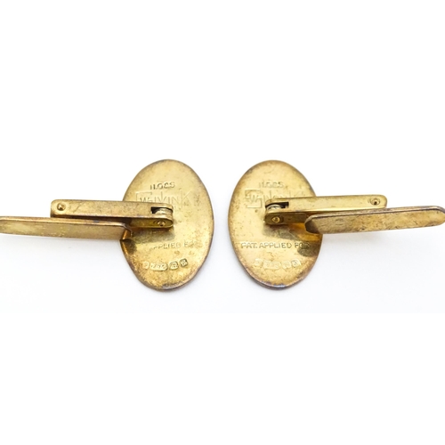 749 - A pair of 9ct gold cufflinks hallmarked Birmingham 1967 maker Henry Griffith & Sons Ltd and titled '... 