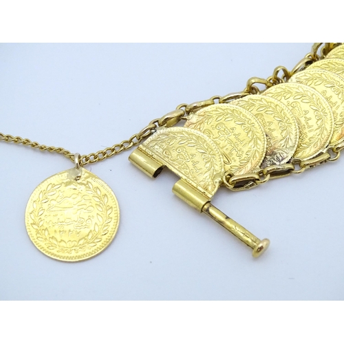 765 - A gold bracelet set with approximately 28 Ottoman coins. Approx. 7