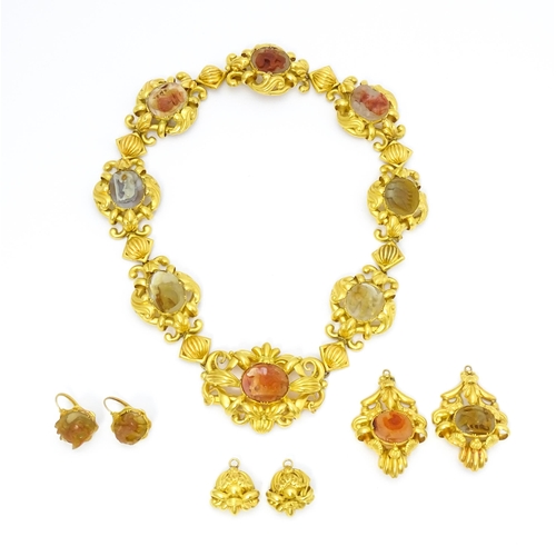 766 - A 19thC Continental gold and gilt metal parure suite of jewellery comprising necklace and drop earri... 