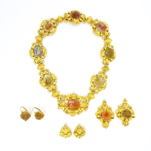 766 - A 19thC Continental gold and gilt metal parure suite of jewellery comprising necklace and drop earri... 