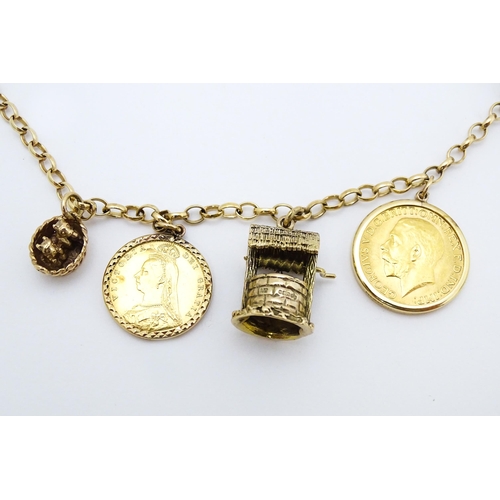 767 - A 9ct gold and yellow metal chain necklace set with three sovereigns in captive mounts, and two half... 