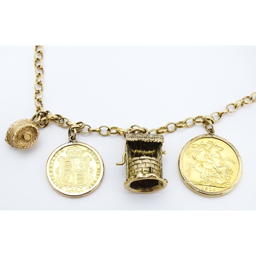 767 - A 9ct gold and yellow metal chain necklace set with three sovereigns in captive mounts, and two half... 