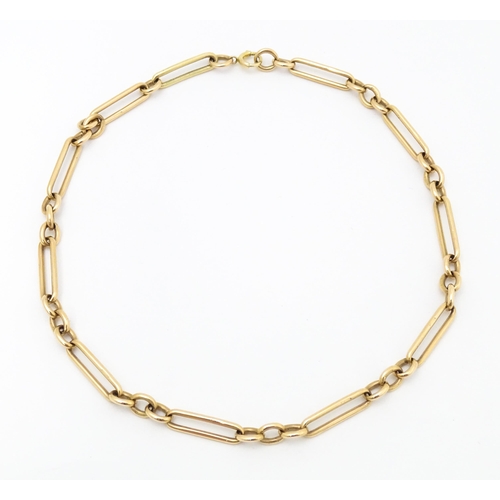 771 - A 9ct gold necklace formed from a pocket watch chain. Approx. 15 1/2