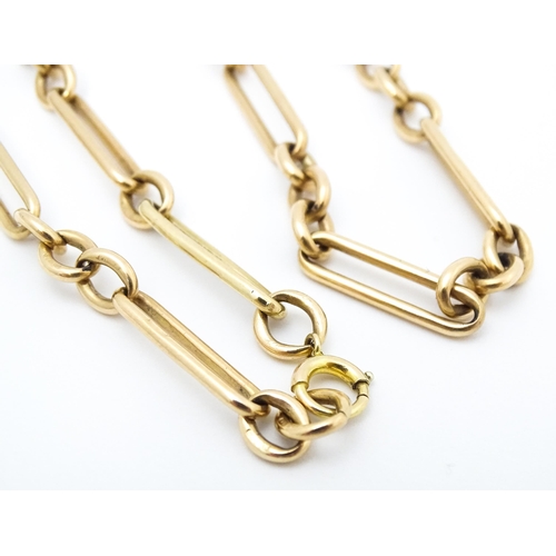 771 - A 9ct gold necklace formed from a pocket watch chain. Approx. 15 1/2