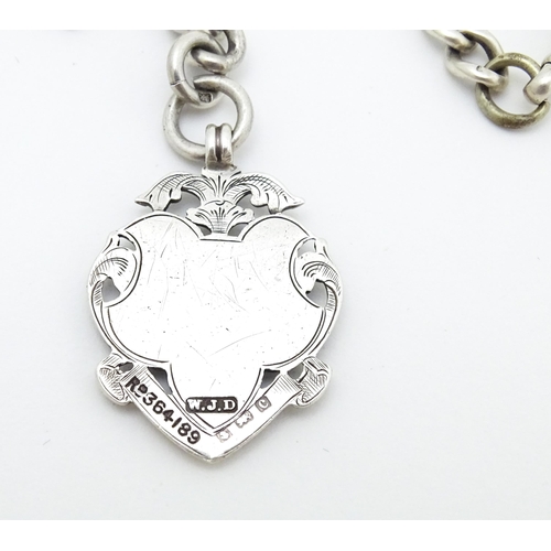 772 - A silver Albert watch chain with T-bar and fob hallmarked Birmingham 1902. Fob approx. 1 1/2