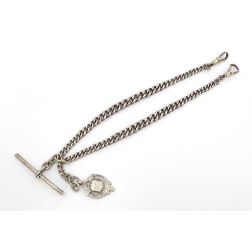 773 - A silver Albert watch chain, with a silver fob hallmarked 1912. Fob approx. 1