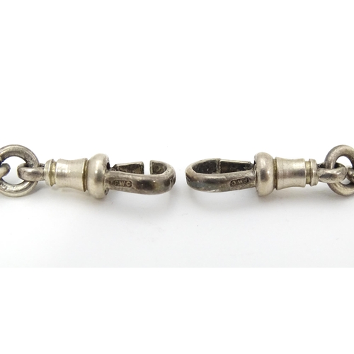 773 - A silver Albert watch chain, with a silver fob hallmarked 1912. Fob approx. 1