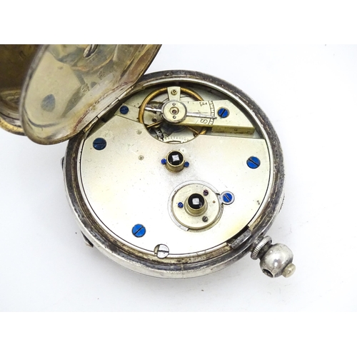 777 - A Continental .935 silver cased pocket watch with white enamel dial having Roman numerals and second... 