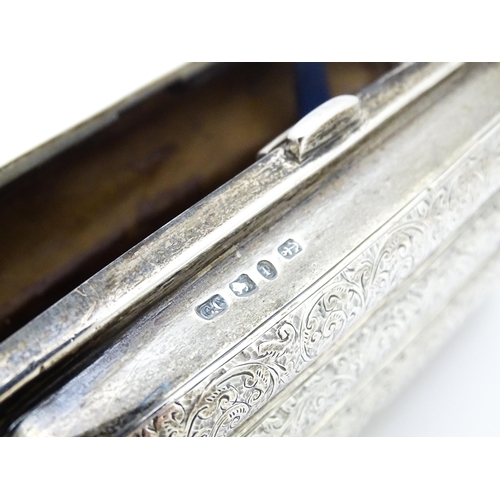 466 - A Victorian silver cigar case with engraved acanthus scroll decoration hallmarked Birmingham 1890, m... 