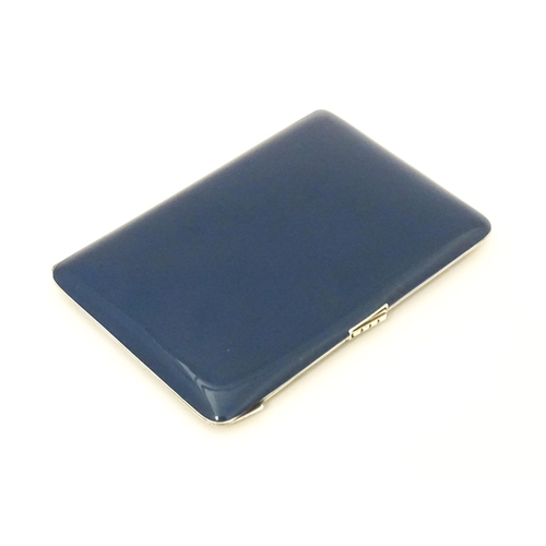 528 - A Continental white metal cigarette case with blue enamel detail. Together with a silver plate mesh ... 