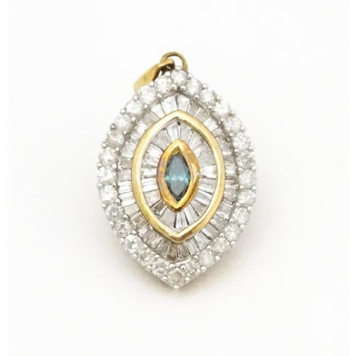 629 - A 9ct gold pendant set with a profusion of diamonds  and central coloured diamond. Approx. 3/4