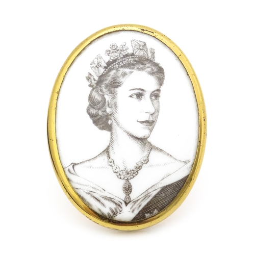 708 - A commemorative Queen Elizabeth II Coronation brooch by Royal Worcester. Approx 2