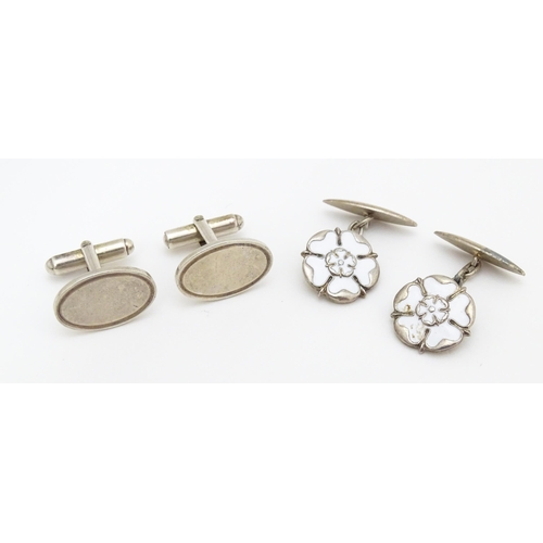 748 - Two pairs of silver cufflinks, one pair with white enamel detail (2+2)