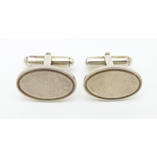 748 - Two pairs of silver cufflinks, one pair with white enamel detail (2+2)