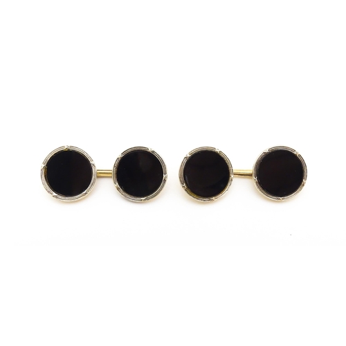 751 - A pair of 9ct gold cufflinks with black enamel detail hallmarked Birmingham 1990, maker Deakin & Fra... 