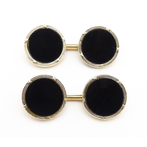 751 - A pair of 9ct gold cufflinks with black enamel detail hallmarked Birmingham 1990, maker Deakin & Fra... 