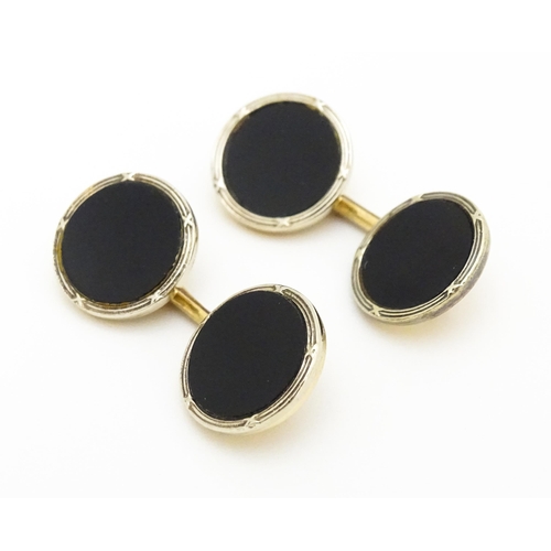 751 - A pair of 9ct gold cufflinks with black enamel detail hallmarked Birmingham 1990, maker Deakin & Fra... 