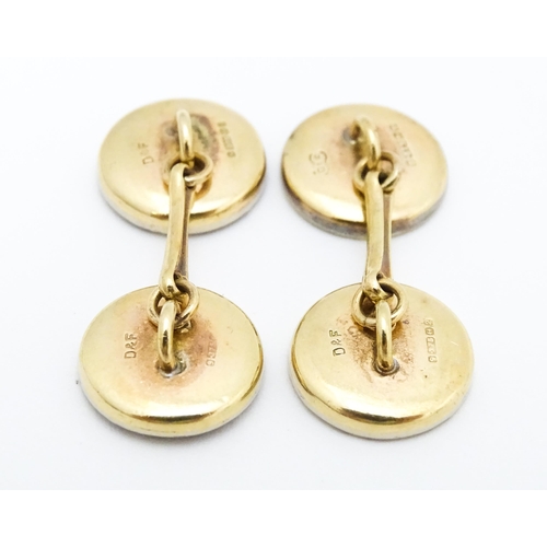 751 - A pair of 9ct gold cufflinks with black enamel detail hallmarked Birmingham 1990, maker Deakin & Fra... 