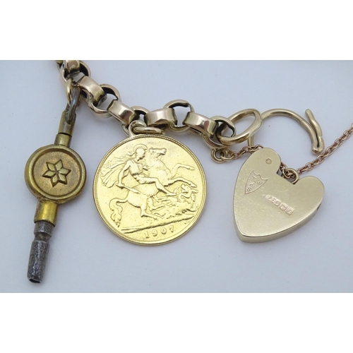 768 - A 9ct gold charm bracelet set with various gold and gilt metal charms to include a half sovereign, f... 