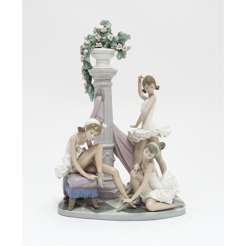 100 - A Lladro figural group Ballet Trio, model no. 5235, depicting three ballet dancers, column and urn o... 