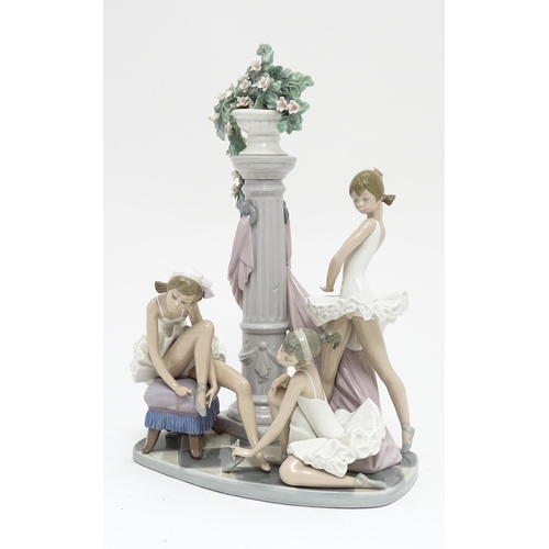 100 - A Lladro figural group Ballet Trio, model no. 5235, depicting three ballet dancers, column and urn o... 