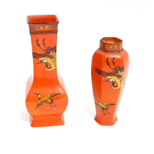 109 - Two Shelley vases, each with an orange ground and flying crane decoration. Pattern no. 8590. Marked ... 