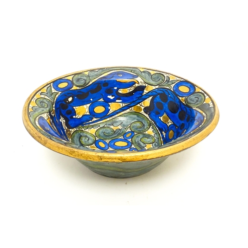 110 - A John Pearson studio pottery lustre bowl with repeated stylised salamander detail. Signed under wit... 