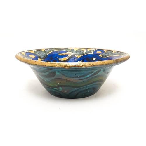 110 - A John Pearson studio pottery lustre bowl with repeated stylised salamander detail. Signed under wit... 